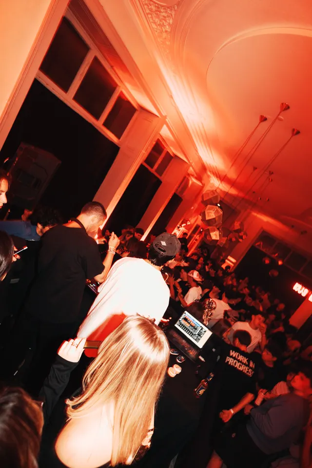 Guests gathered near the DJ booth
